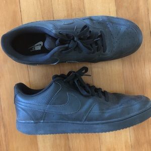 Lightly used black on black Nike shoes